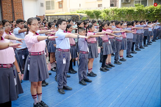 Students taking oath during assembly