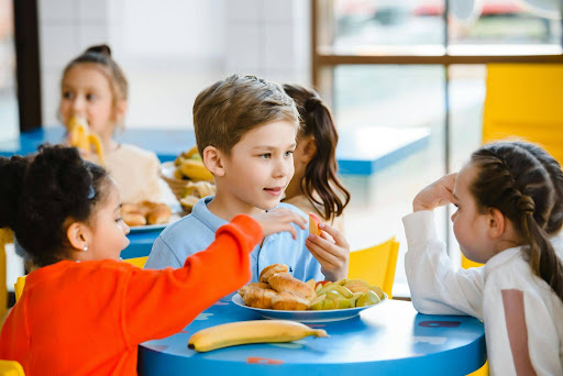 Children enjoying a nutritious meal together at school
