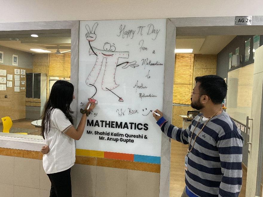 Student solving problem with teacher