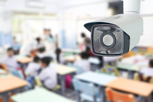 Classroom CCTV camera monitoring students for enhanced safety