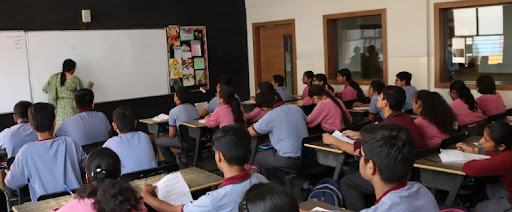 Students attending a classroom lesson