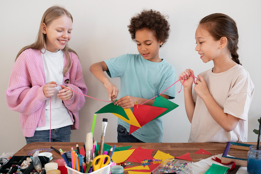 Children creating crafts together